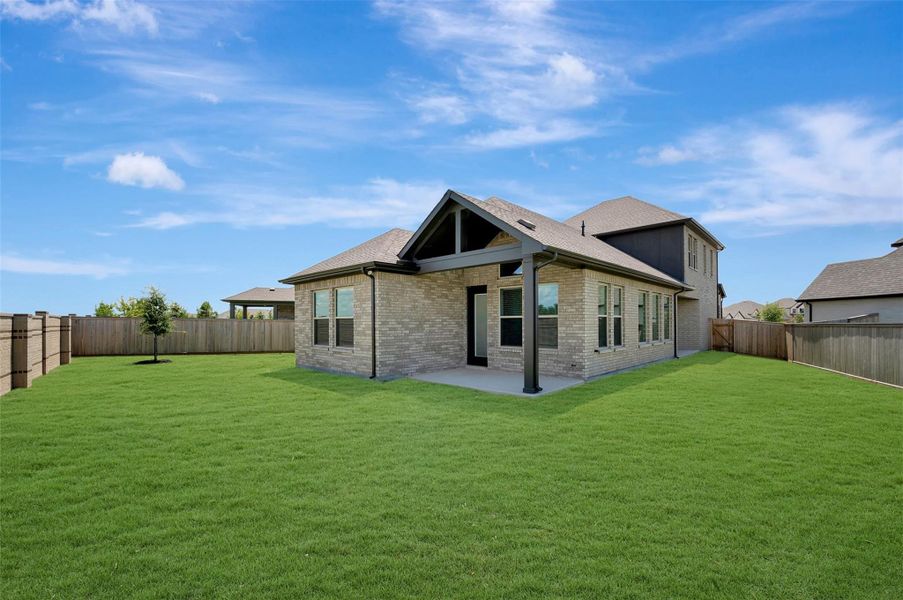 Exterior details and patio area of a home in Prairieland Village - Grove Collection, Cypress (Image 25). Exterior details and patio area of a home in Prairieland Village - Grove Collection, Cypress (Image 25).