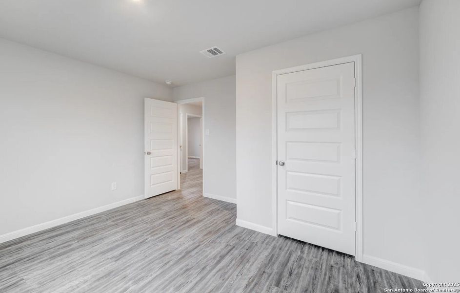 Spacious, unfurnished interior of a new home in The Park, Uvalde (Image 8).