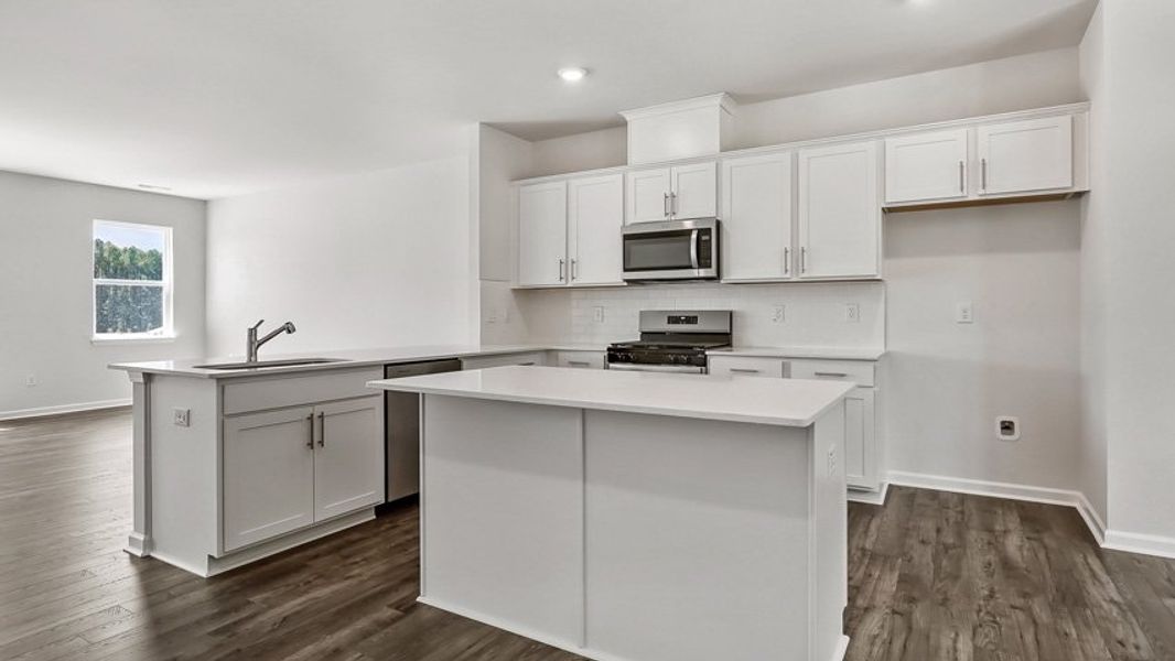 Representative furnished interior of a home built from the HADLEIGH by D.R. Horton in The Townes Park, Apex (Image 13).