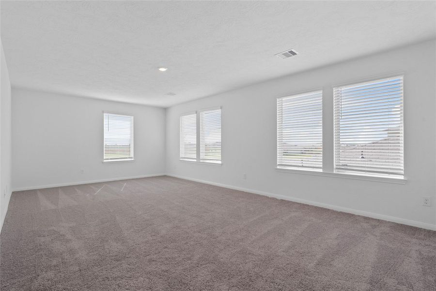 Head upstairs and enjoy this spacious Loft—an additional living area perfect for a game room, media space, or a peaceful retreat.
