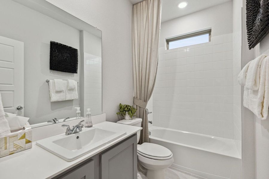 Bathroom in the Claret home plan by Trophy Signature Homes