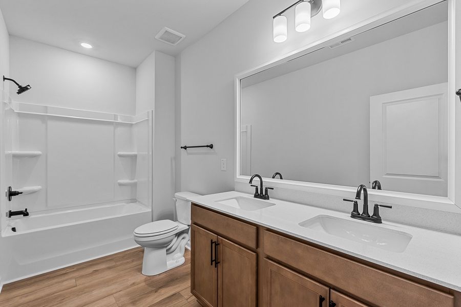 Furnished interior view inside a new home in Fieldstone, Lexington (Image 15).