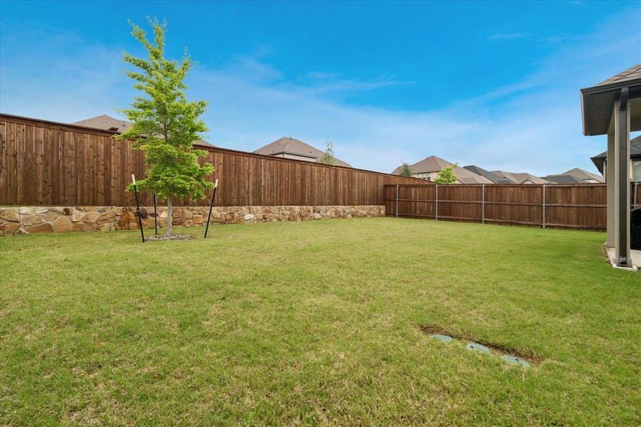 Exterior details and patio area of a home in Devonshire, Forney (Image 4).