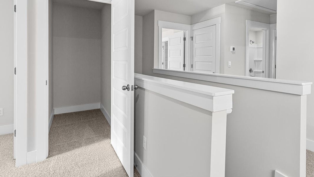 Spacious, unfurnished interior of a new home in The Haven at Indigo Preserve, Leland (Image 23).