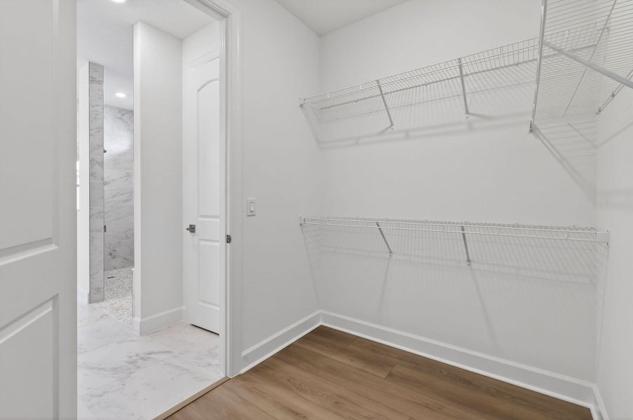 Spacious, unfurnished interior of a new home in Del Webb Tradition, Port St. Lucie (Image 64).