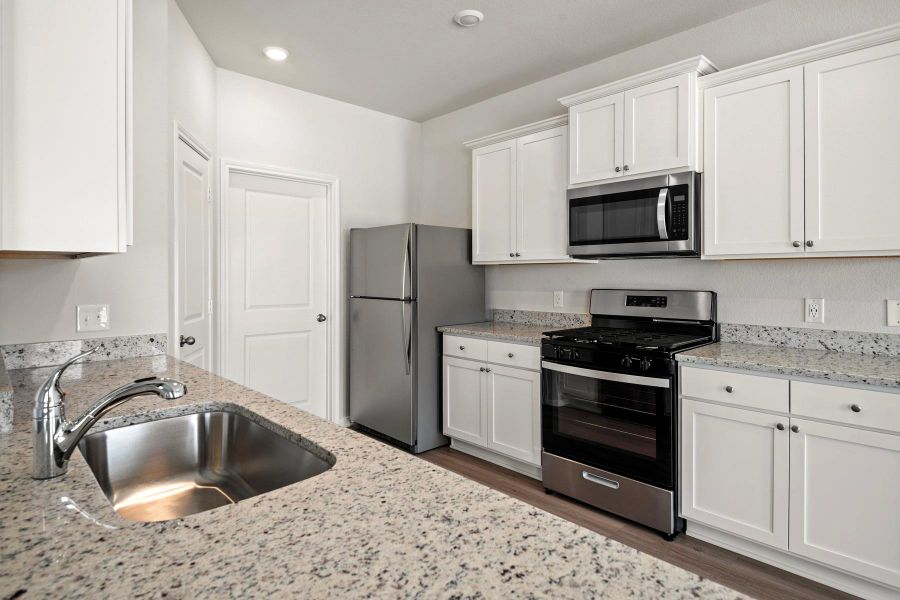 Furnished interior view inside a new home in Sweetwater Ridge, Conroe (Image 6).