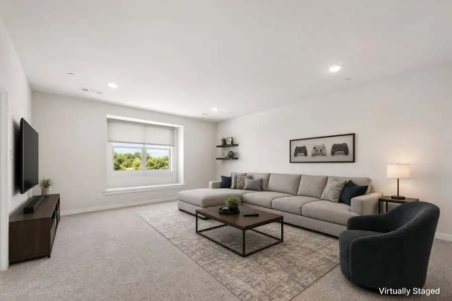 Furnished interior view inside a new home in Cottonwood Creek, Rowlett (Image 12).