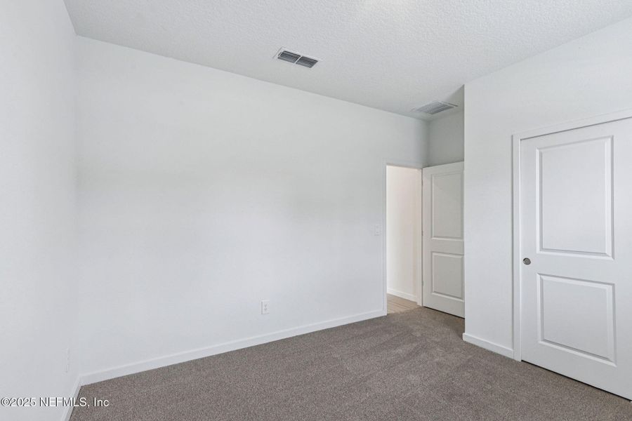 Spacious, unfurnished interior of a new home in Flagler Village - Signature Series, Palm Coast (Image 15).