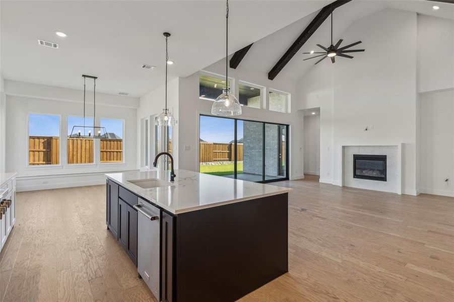 With the kitchen open to the dining and family rooms, this home was designed for entertaining!