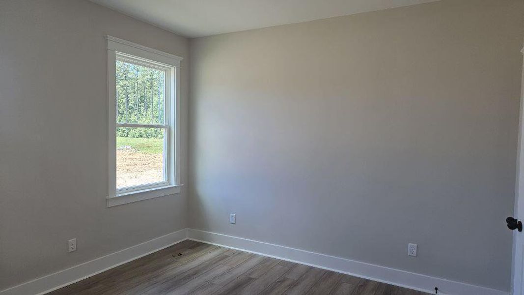Spacious, unfurnished interior of a new home in The Enclave at French Quarter Creek, Huger (Image 12).