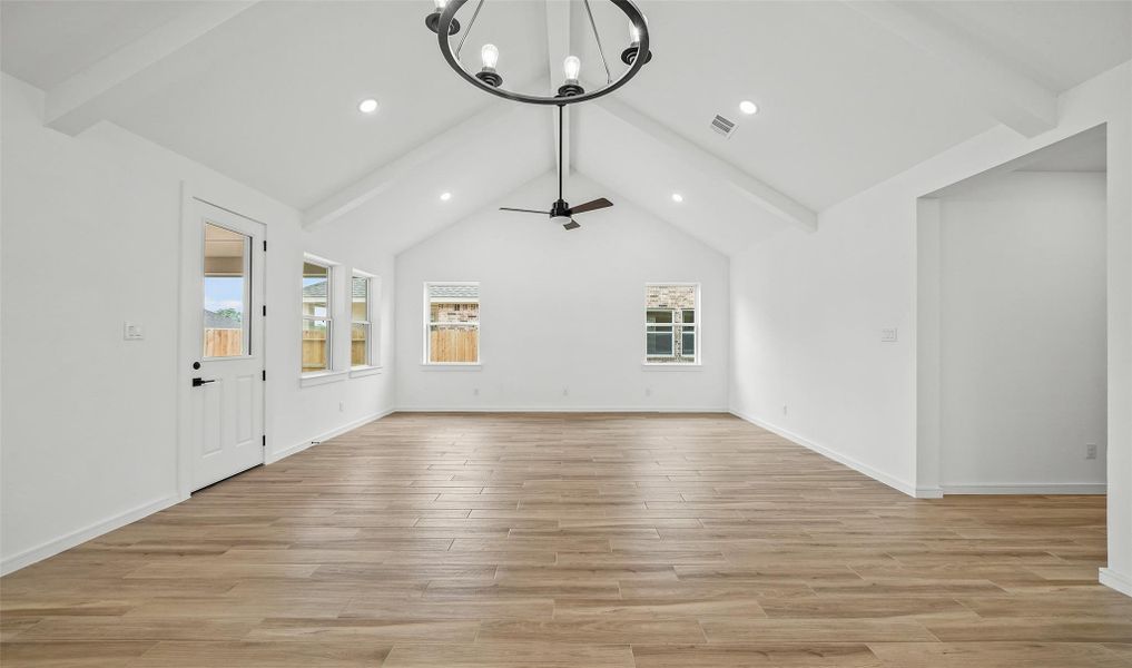 Spacious great room and dining area with vaulted ceilings (*Photo not of actual home and used for illustration purposes only.)