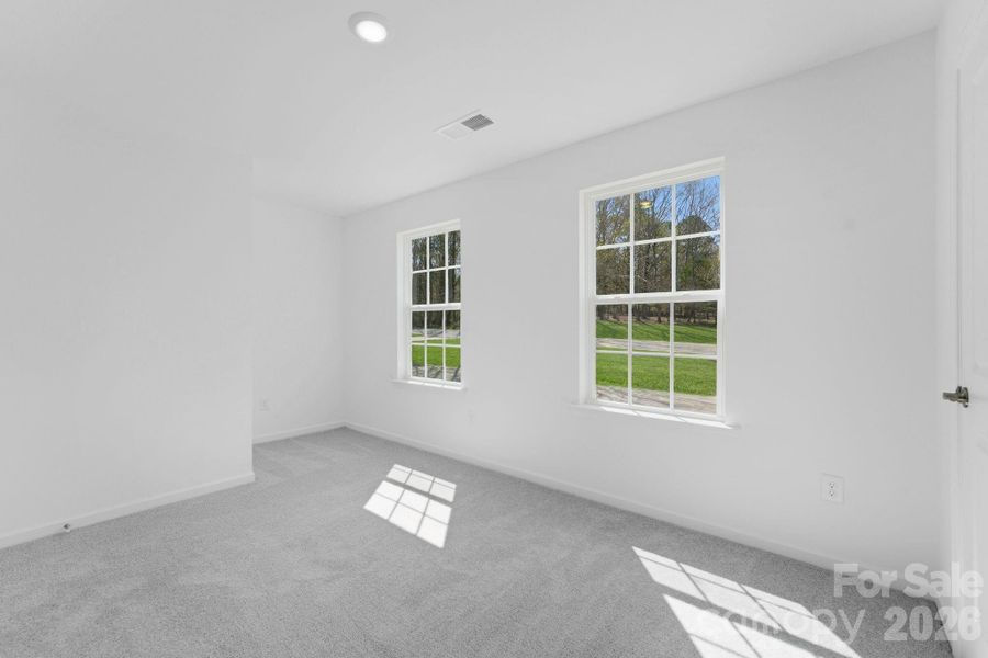 Spacious, unfurnished interior of a new home in Cannon Village, York (Image 9).
