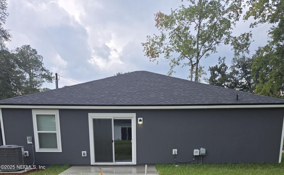 Front exterior of a new home in , Jacksonville, FL, highlighting curb appeal (Image 10).
