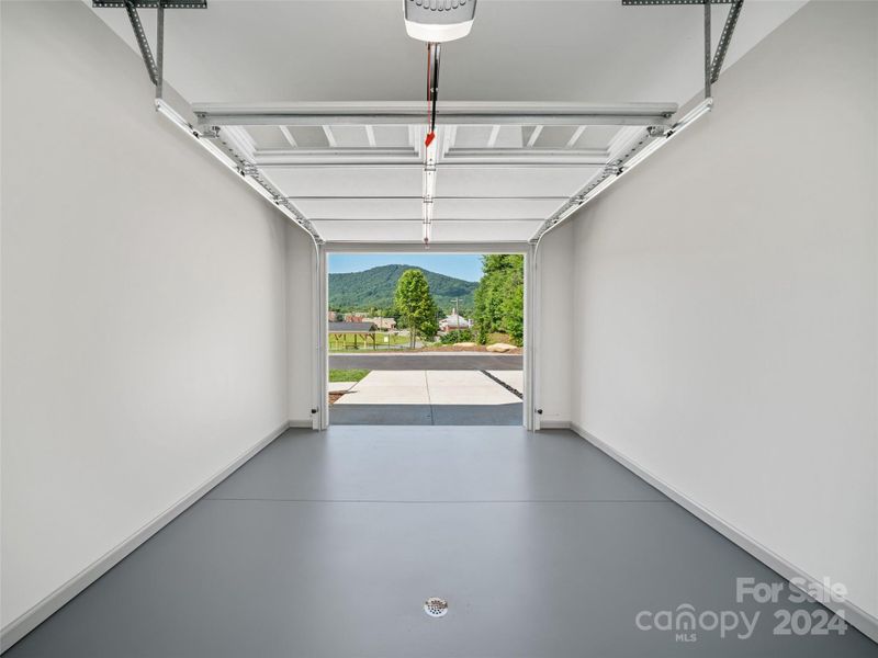 One Car garage with Utility Room to rear with ample extra storage space One Car garage with Utility Room to rear with ample extra storage space