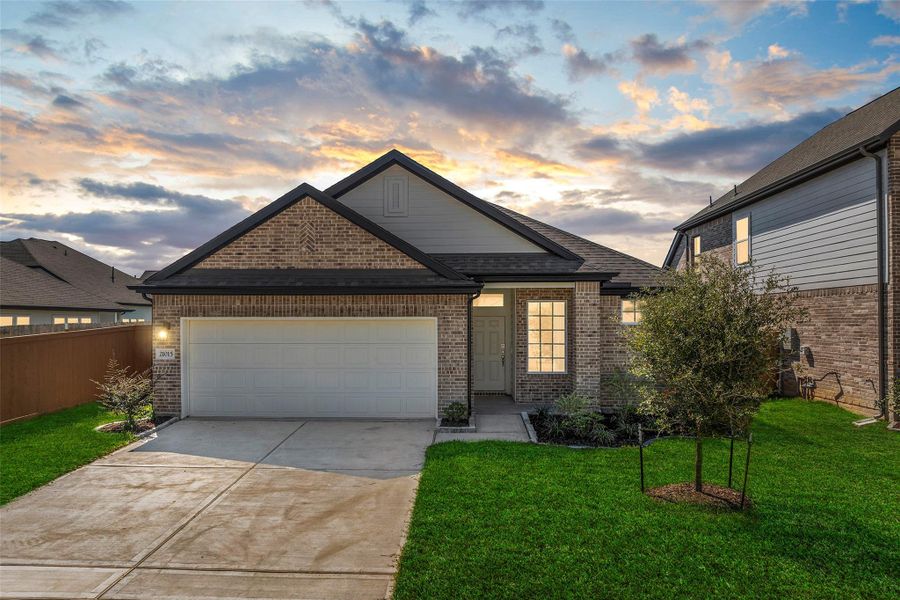 Front exterior of a new home in , Cypress, TX, highlighting curb appeal (Image 1). Front exterior of a new home in , Cypress, TX, highlighting curb appeal (Image 1).