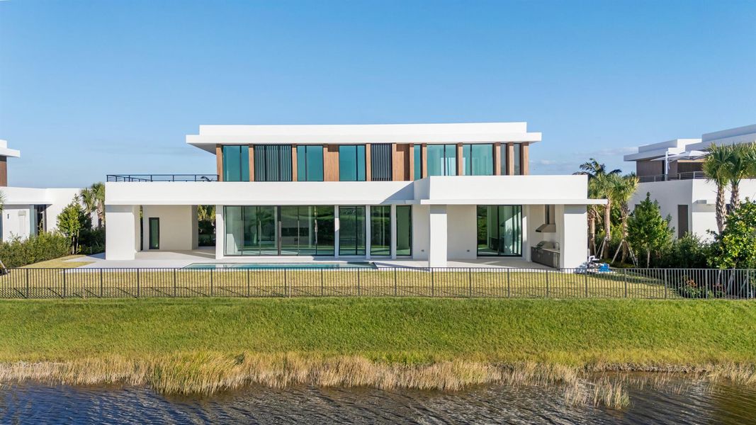 Front exterior of a new home in , Palm Beach Gardens, FL, highlighting curb appeal (Image 1).