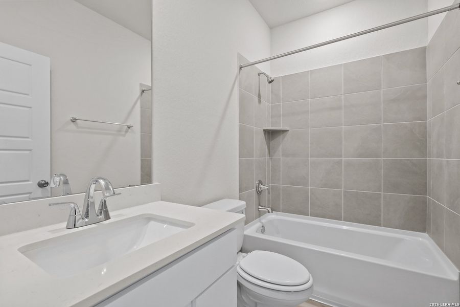 Furnished interior view inside a new home in Cinco Lakes, San Antonio (Image 9).