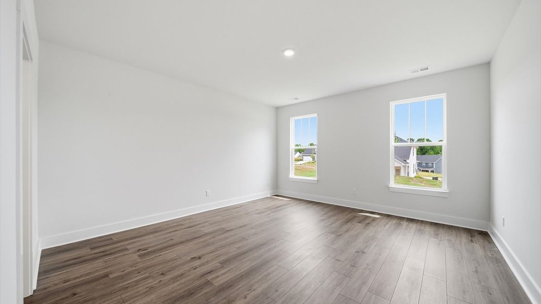 Desirable primary suite layout with spacious en suite bath in a proven, established community in Moore, SC