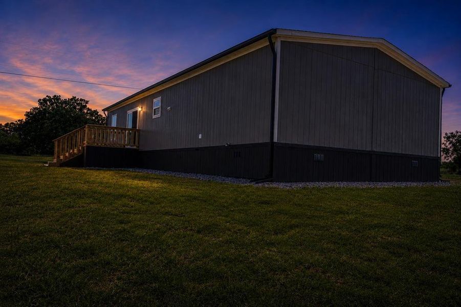 Exterior details and patio area of a home in , Poolville (Image 25).