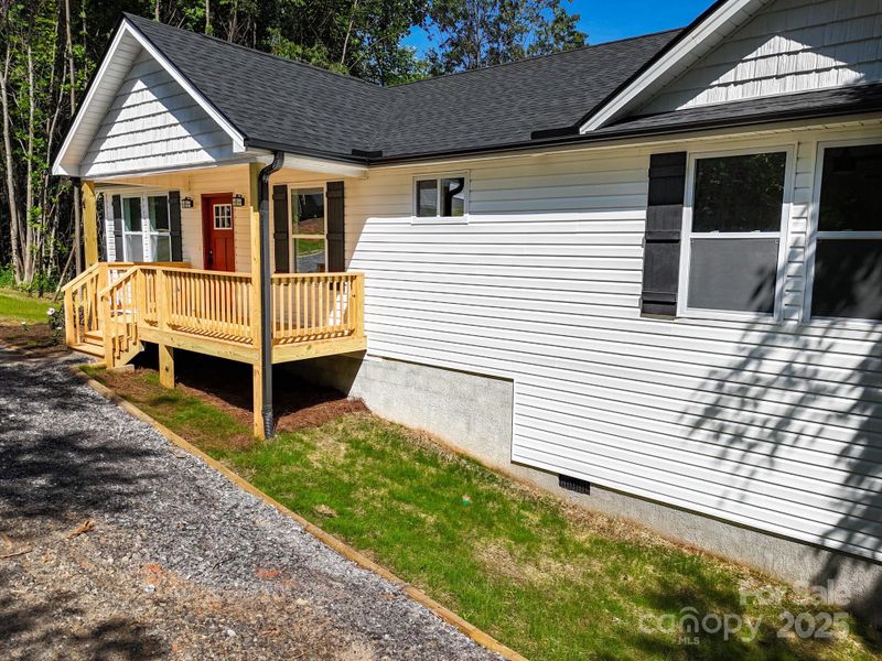 Front exterior of a new home in , Candler, NC, highlighting curb appeal (Image 22). Front exterior of a new home in , Candler, NC, highlighting curb appeal (Image 22).