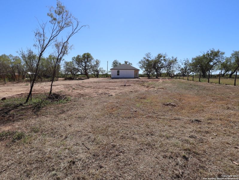 Exterior details and patio area of a home in , Von Ormy (Image 9).