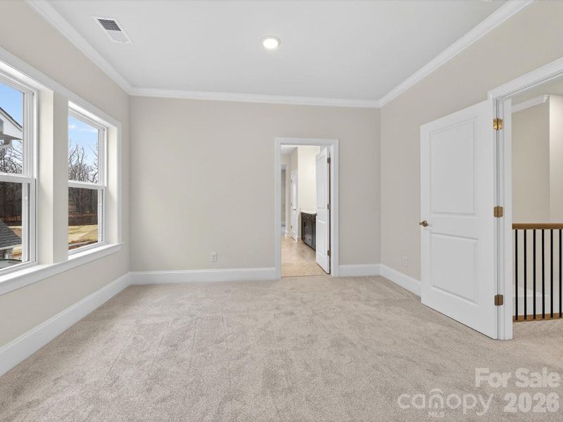 Spacious, unfurnished interior of a new home in North Creek Village, Huntersville (Image 34).