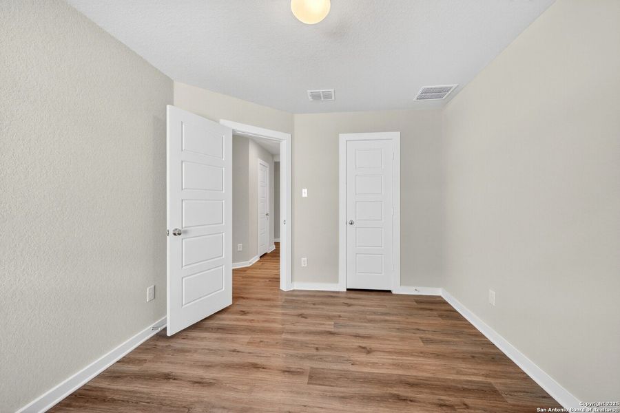 Spacious, unfurnished interior of a new home in Winding Brook, San Antonio (Image 38).