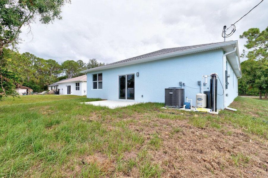 Front exterior of a new home in , Vero Beach, FL, highlighting curb appeal (Image 22). Front exterior of a new home in , Vero Beach, FL, highlighting curb appeal (Image 22).