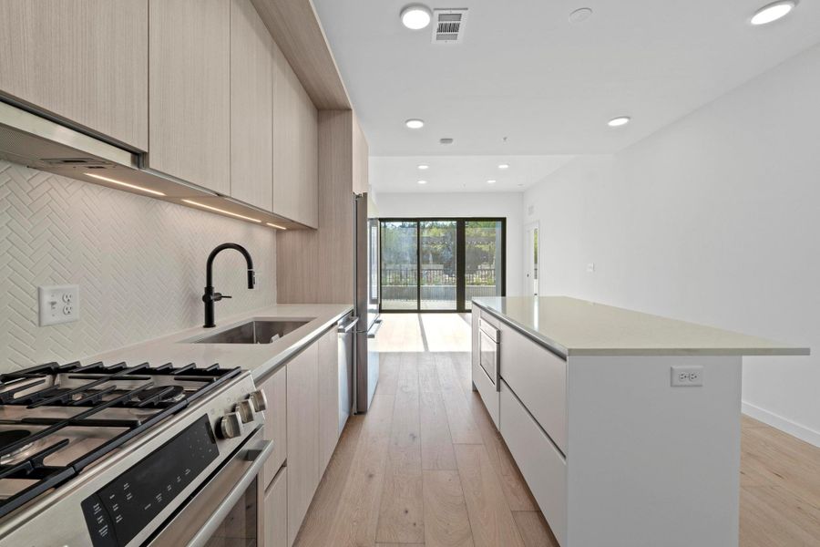 Furnished interior view inside a new home in One Oak, Austin (Image 13).