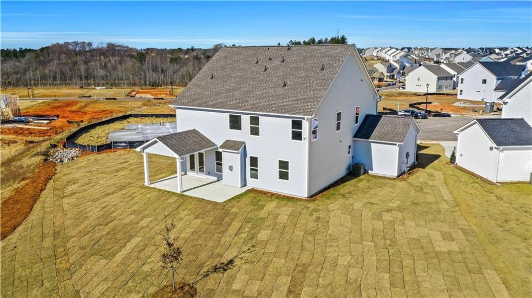Exterior details and patio area of a home in Twin Lakes, Hoschton (Image 35).