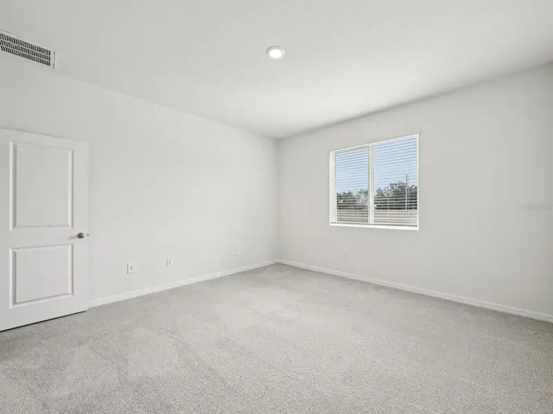 Spacious, unfurnished interior of a new home in Oakfield Trails - Classic Series, Parrish (Image 17).