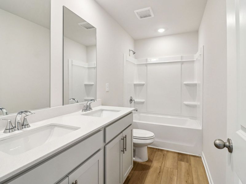 Furnished interior view inside a new home in Harmony Manor, Fairburn (Image 11).