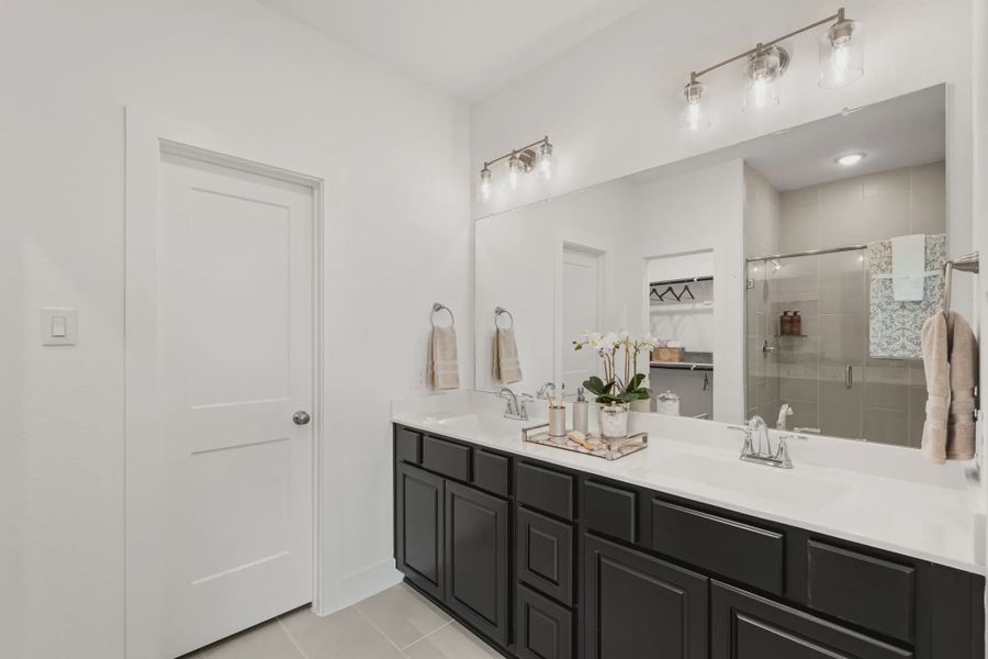 Representative furnished interior of a home built from the Chalet by Chesmar Homes in Meridiana Townhomes, Iowa Colony (Image 16).