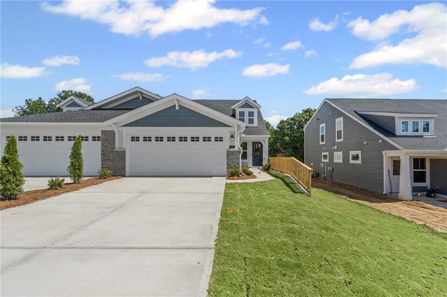 Front exterior of a new home in Villas at Gold Creek, Dawsonville, GA, highlighting curb appeal (Image 22).