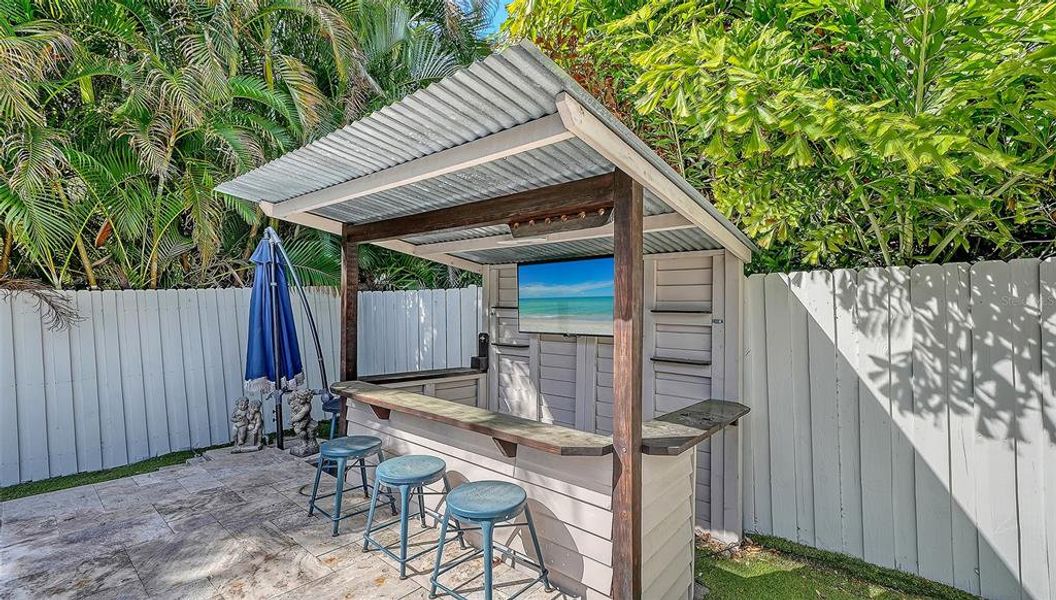 Exterior details and patio area of a home in , Sarasota (Image 29).