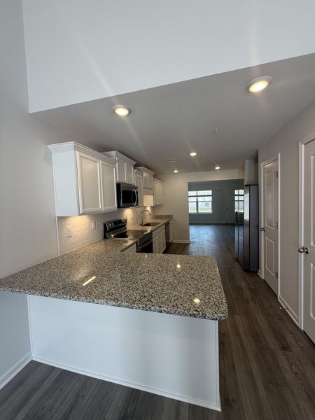 Furnished interior view inside a new home in Legacy Fields, Pleasant View (Image 6).