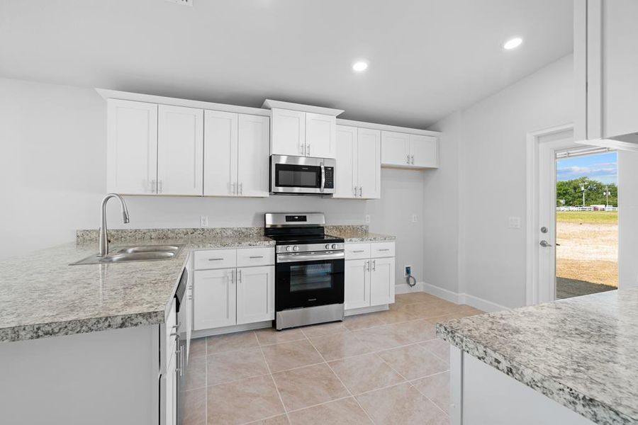 Furnished interior in a model home at Rolling Hills in Bell (Image 5).