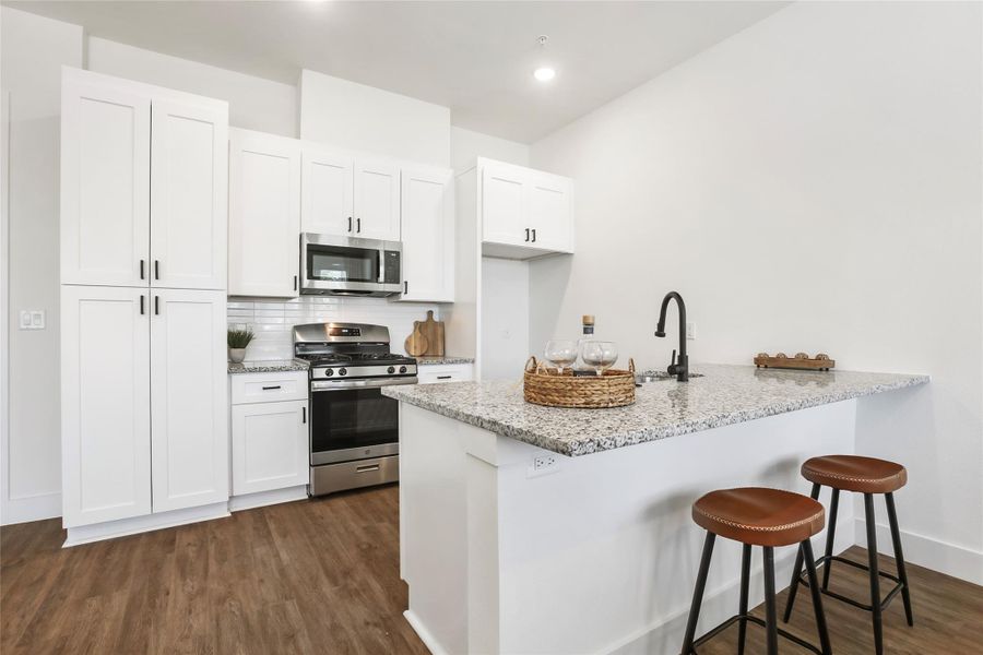 Furnished interior view inside a new home in East Grove Condominiums, Austin (Image 5).