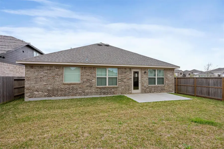 Fenced Backyard with a Patio