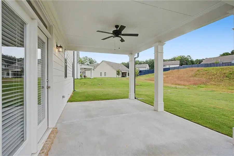 Exterior details and patio area of a home in Springside Reserve, Powder Springs (Image 3).