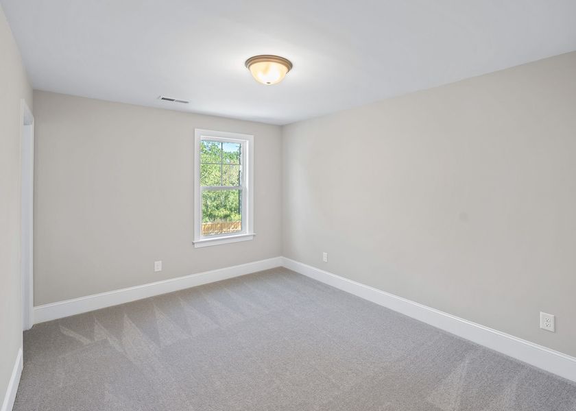 Spacious, unfurnished interior of a new home in Carolina Creek, Hampstead (Image 39).
