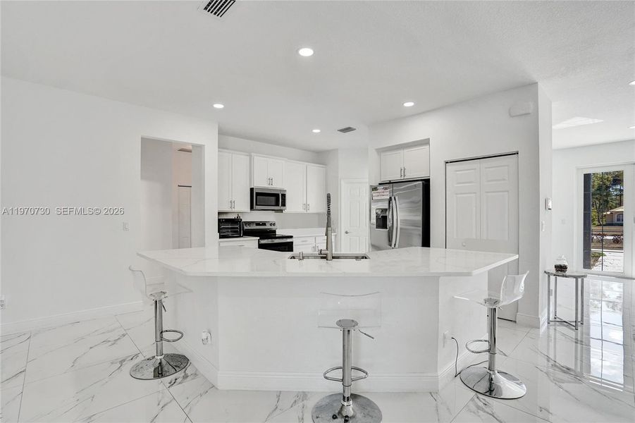 Furnished interior view inside a new home in , Loxahatchee (Image 68).