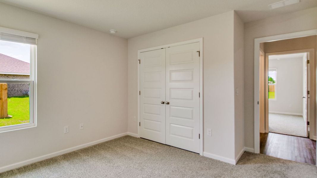 Spacious, unfurnished interior of a new home in The Enclave at Bar W Ranch, Baker (Image 28).