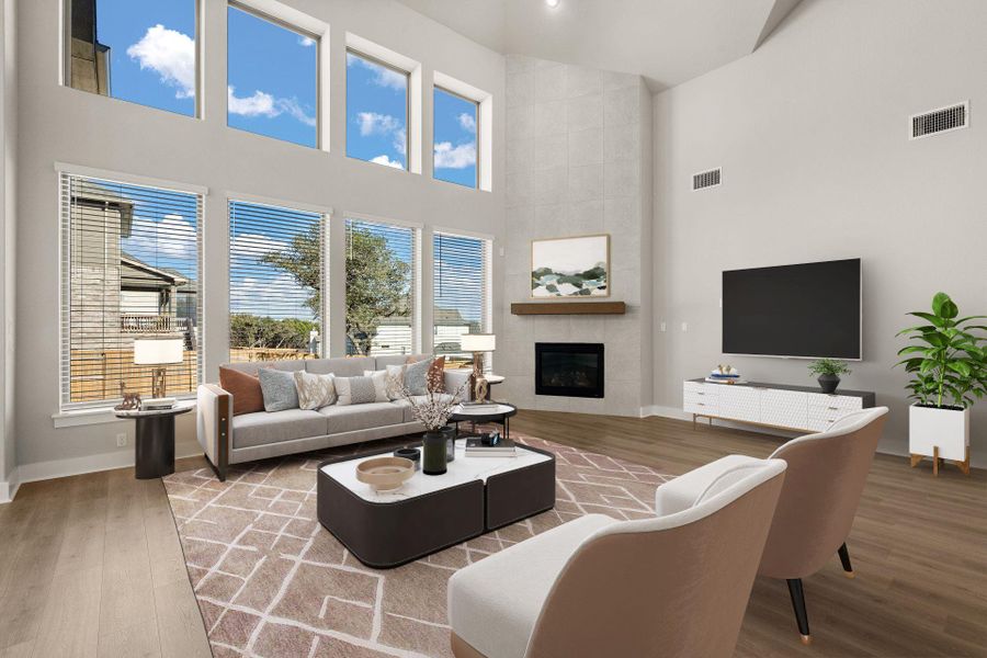Family Room with soaring ceilings & fireplace - Virtually Staged
