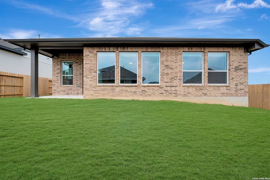 Exterior details and patio area of a home in Meyer Ranch – Select Reserve Series, New Braunfels (Image 29).