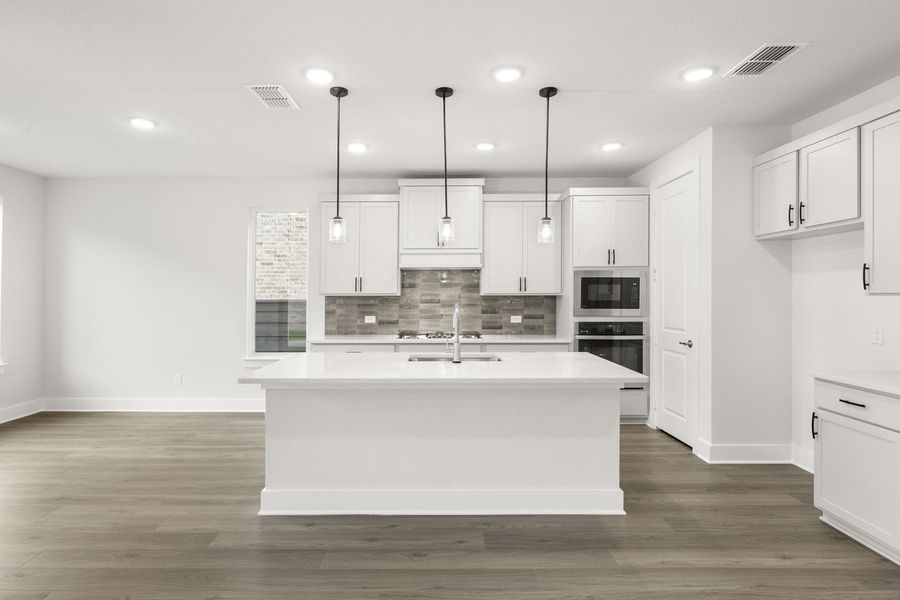 Furnished interior view inside a new home in Union Park, Little Elm (Image 10).