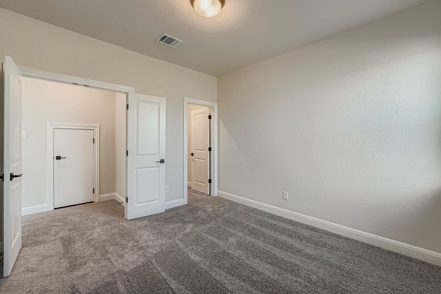 Spacious, unfurnished interior of a new home in 6 Creeks, Kyle (Image 6).