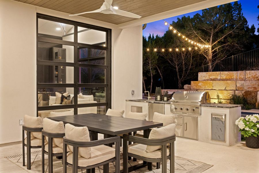 Summer evenings perfected. The deep-set covered terrace offers a sheltered vantage point to take in the pool and surrounding landscape