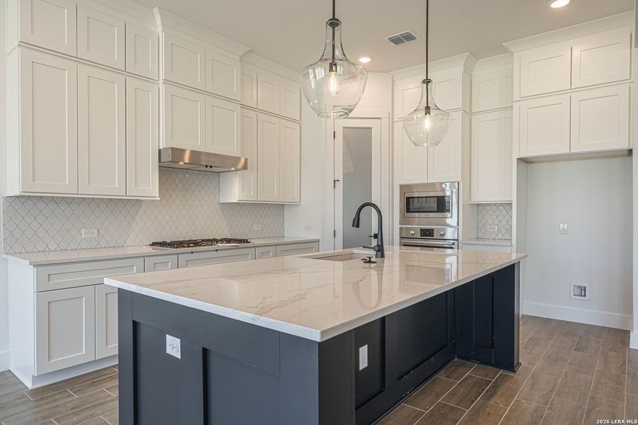 Furnished interior view inside a new home in , Kerrville (Image 8).
