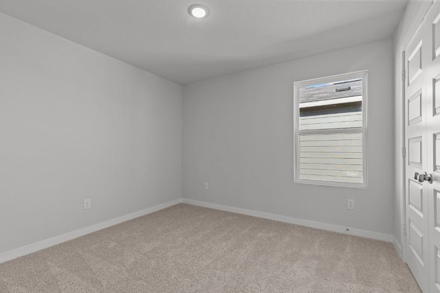 A room with a door and a window. A room with a door and a window.